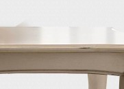 Серо-бежевый патинированный стол на резных ножках
