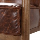 Кресло в обивке из винтажной коричневой кожи