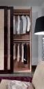 Трехдверный шкаф-купе с тиснеными кожаными вставками бежевого от