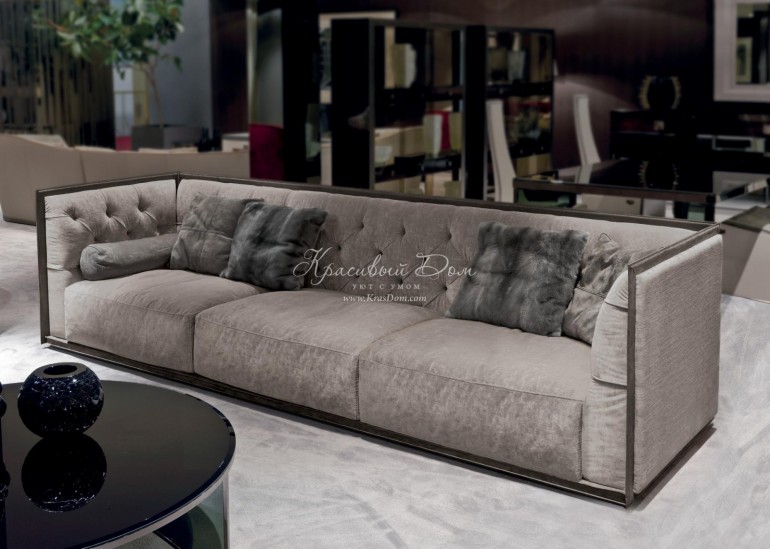 Серый бархатный диван с каретной стяжкой на спинке