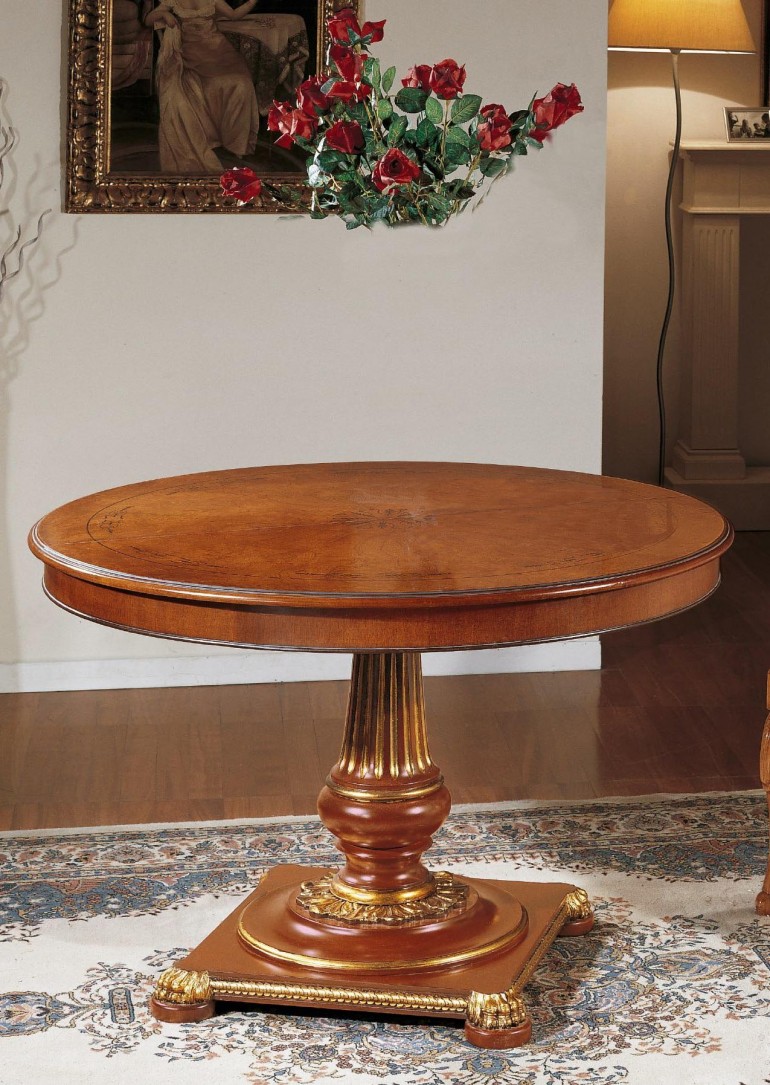 Обеденный стол орехового оттенка с круглой раздвижной столешнице