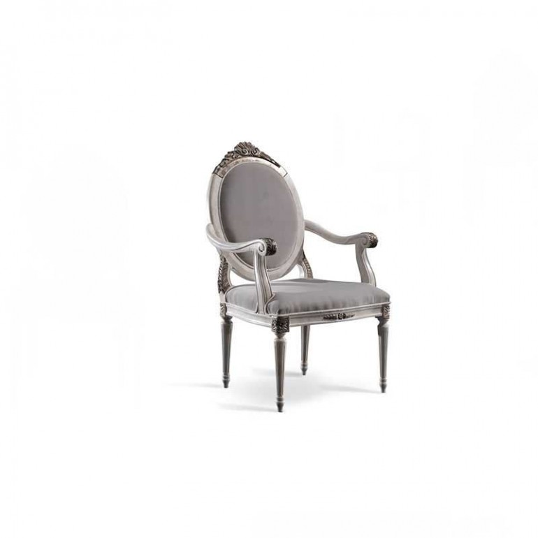 Серое кресло с овальной спинкой и рельефной серебристой резьбой