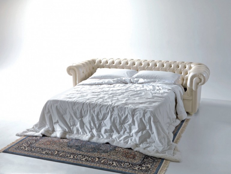 Дизайнерский диван-кровать в кожаной обивке цвета слоновой кости