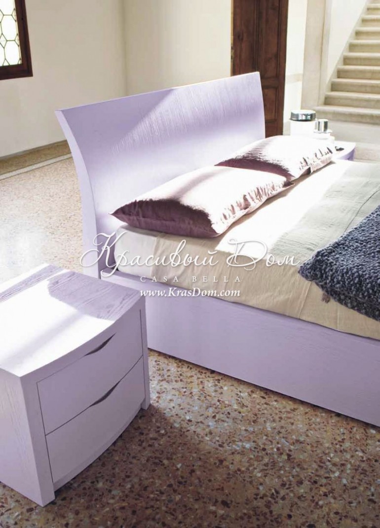 Элегантная двуспальная кровать в стиле модерн.