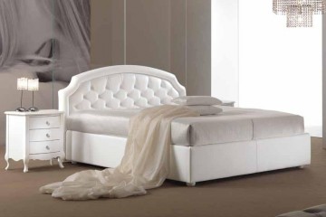 Белая кровать с округлым мягким изголовьем, украшенным каретной стяжкой - pma/148