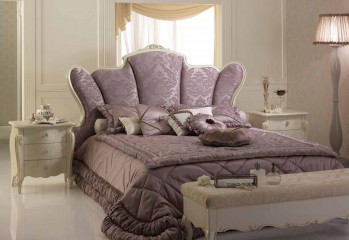 Кровать с большим мягким фигурным изголовьем в текстильной обивке лилового оттенка с узорами - pma/097