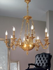 Позолоченная люстра на 8 свечей с полусферой из янтарного стекла и декоративными цепями - pos/352