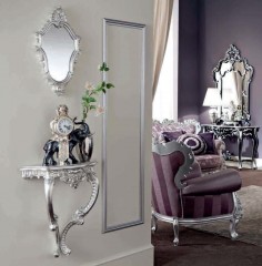 Фигурное настенное зеркало в резной серебристой раме - mdg/1046