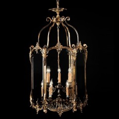 Люстра на фигурном патинированном каркасе с 9 свечами в застекленном плафоне - bad/278