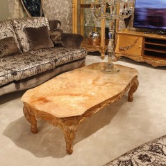 Фигурный золотистый мраморный стол на резном подстолье - ezb/491