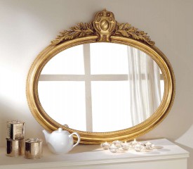 Овальное зеркало в золотой резной раме с крупным декором - msvgf/0075