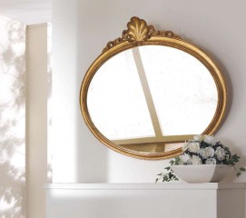 Классическое овальное зеркало в резной деревянной раме золотистого цвета - msvgf/0076