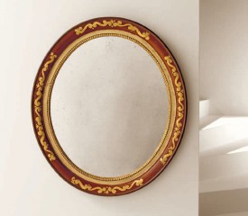 Эффектное овальное зеркало в красно-коричневой раме с золотой отделкой - msvgf/0111
