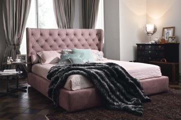 Кровать в темно - розовой текстильной обивке - mbib/051